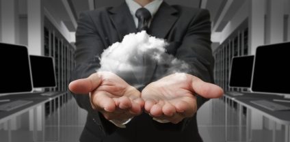 a man in a suit holding out his hands with a cloud inside
